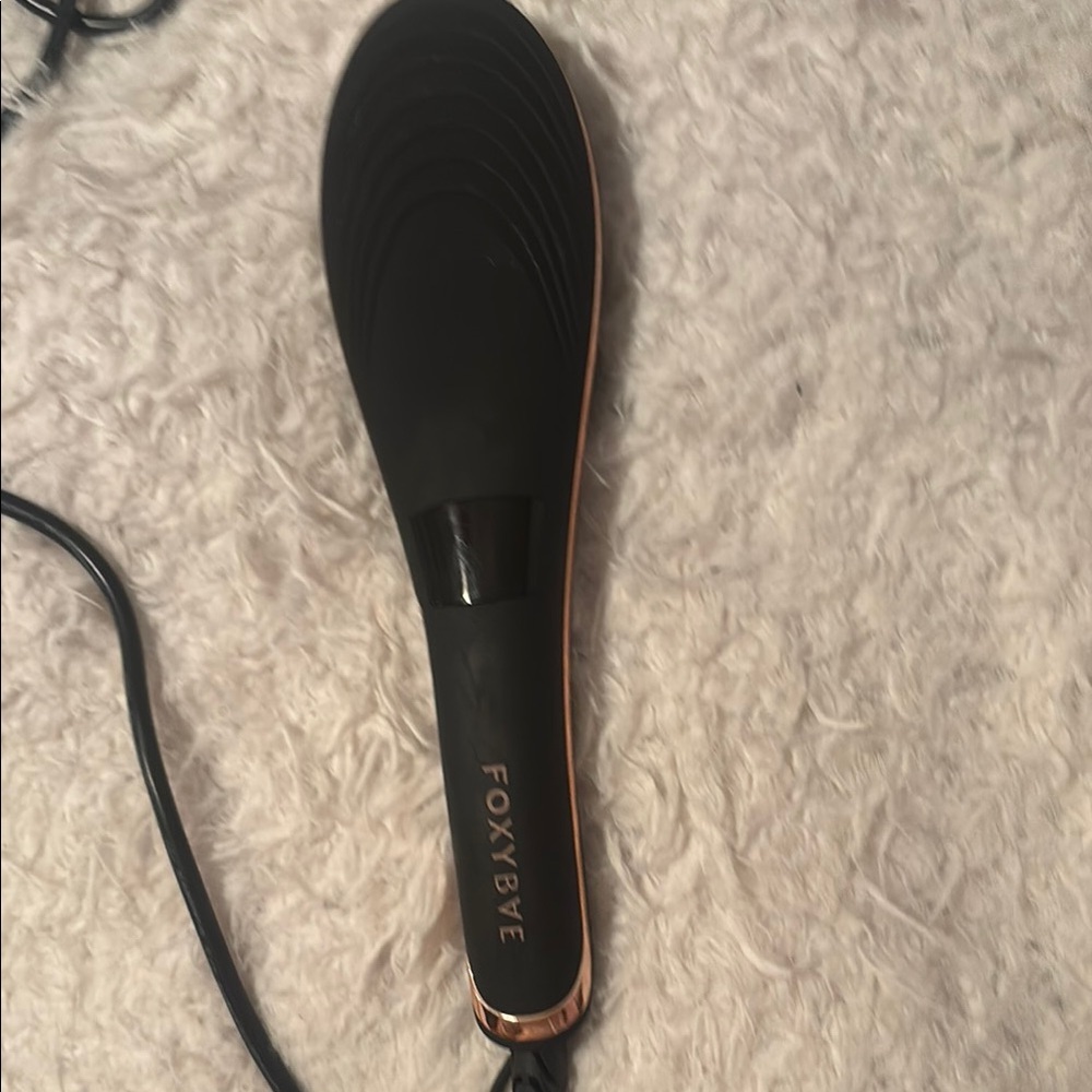 Black Hair Straightener with Textured Grip and Sleek Design